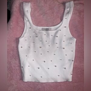 white tank top with pearls, fits like a medium!